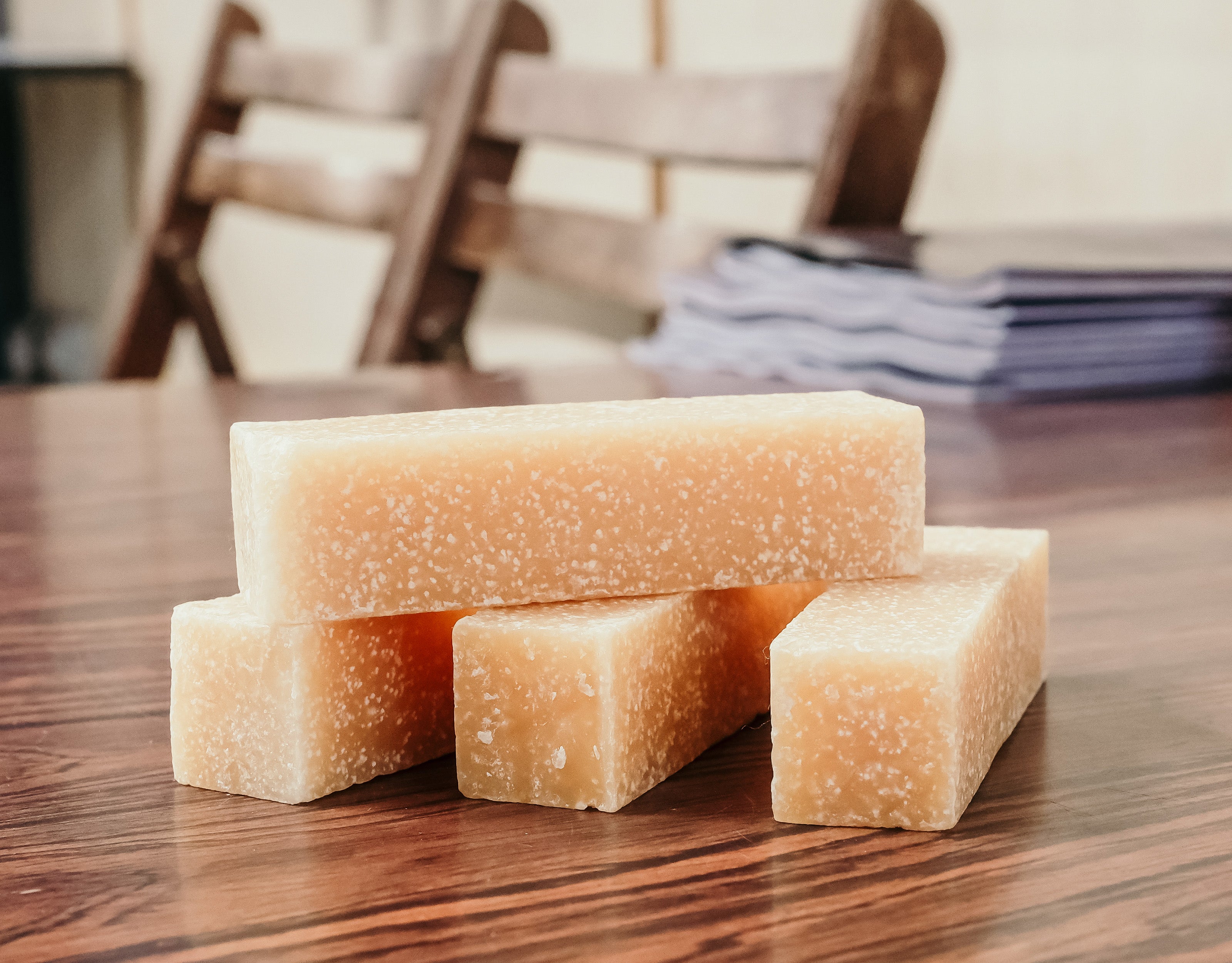 Vegan soap bars used for gentle stain removal on clothing and delicate textiles