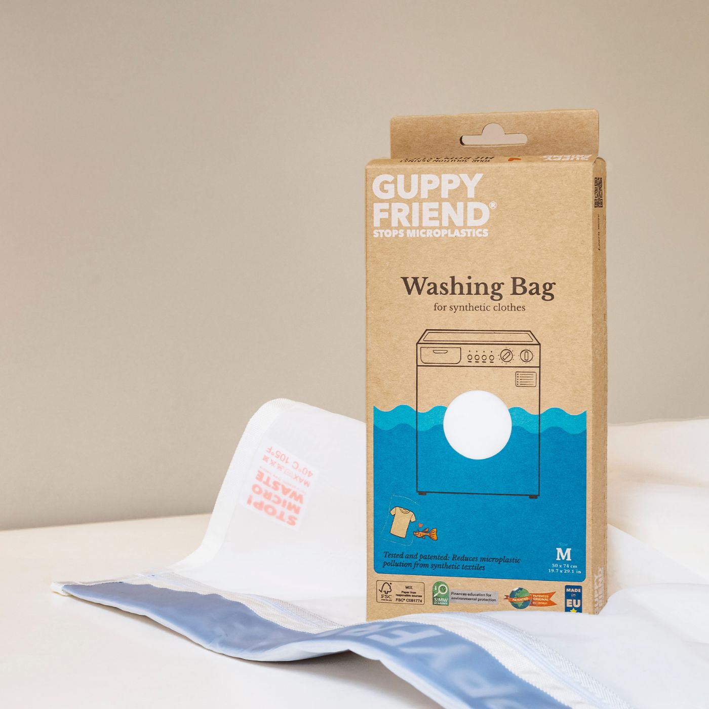 Guppyfriend vaskepose med syntetisk sportstøj i vaskemaskine